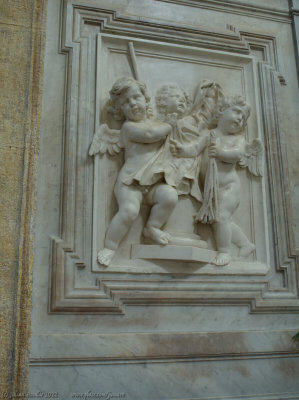 Wall carving with cherubs