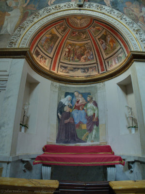 Side altar with frescoes