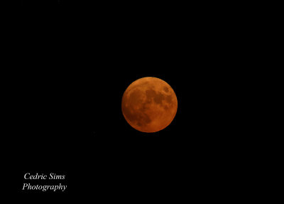    The moon is orange from the smoke of the Mosquito Fire