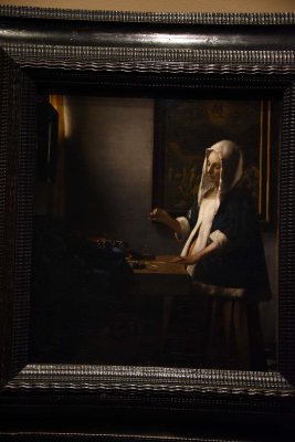 Woman Holding a Balance (c. 1664) - Johannes Vermeer - 6001