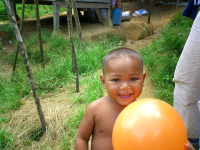 We saw some indigenous people. This little guy was very happy when one of the girls gave him a balloon.