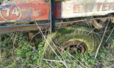 A derelict Phillips Mills Trailer in a field in Wiltshire.