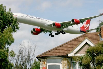 Last house before the runway at London Airport. Incredibly noisy here.