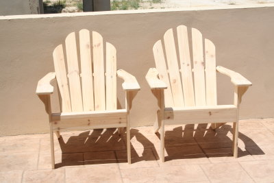 A pair of Adirondack garden chairs