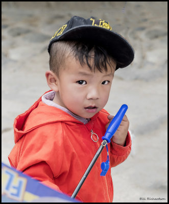 boy w umbrella.jpg