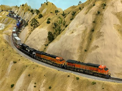 ScaleTrains BNSF C44-9W 4572 leading marine-stacks.