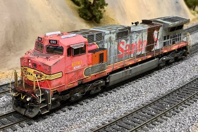 ScaleTrains C44-9W BNSF 690 showing all 28 years of reality.