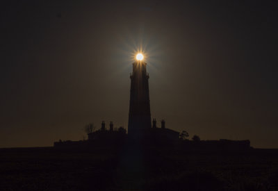 asunbehind lighthouse.jpg