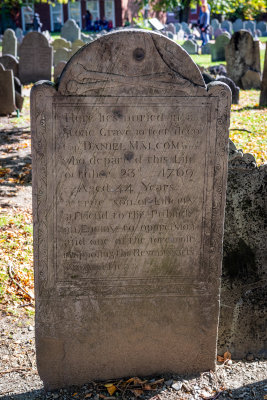 Grave marker used by the British for target practice, Copps Hill burying ground.
