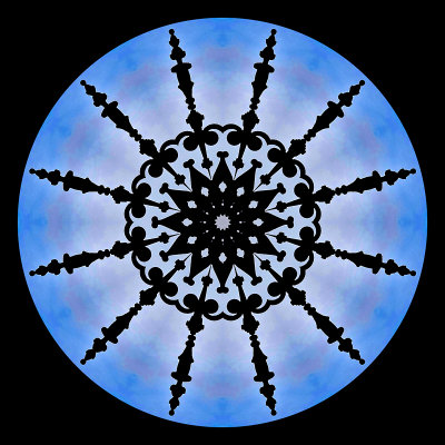 Kaleidoscopic picture created with an iron gate and blue sky