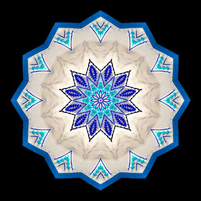 Kaleidoscope created with a picture of textile embroidery