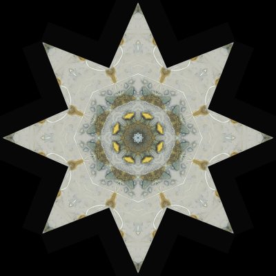 Kaleidoscopic picture created with an ice patch seen on an upaved path