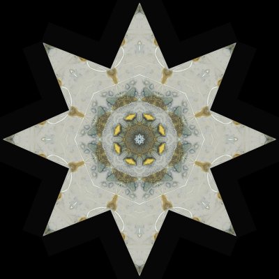 Kaleidoscopic picture created with an ice patch seen on an upaved path