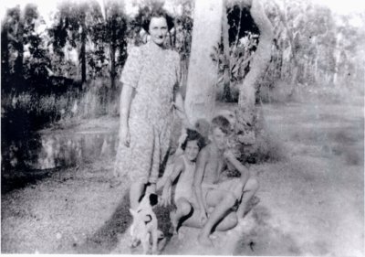 Looking back in time - My Mother, me, big brother John, and puppy, Digger, named after my Grandma's dog.