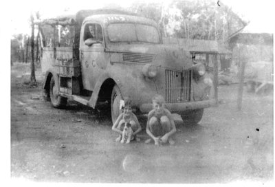 Darwin 1945, Dad driving Doreen Beatrice, John.  Photo taken by my Mother, Ronnie, with a Brownie Box camera.