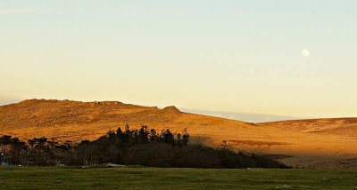 Belstone Tor at sunset with Moon rising.