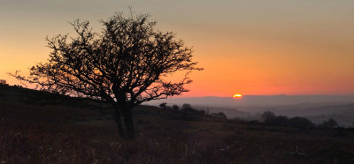 Sun setting behind Bodmin Moor