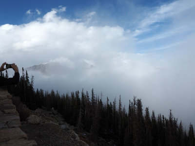 As the clouds clear partially, Rainbow Curve, Rocky Mountain NP