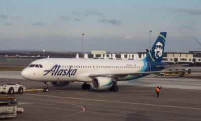 Air Alaska jet pushing back at Dulles airport