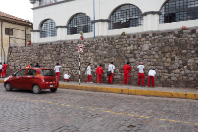 Cleaning up a wall in Cusco