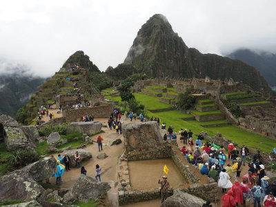 Approaching the ruins of Machu Pichu among the crowds