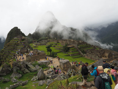 Approaching the ruins of Machu Pichu among the crowds
