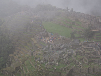 The central plaza on Machu Picchu hidden in the mist