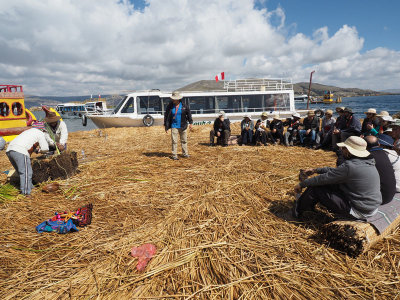 Seated for a presentation on one of the Uros islands