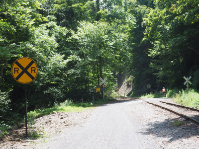 The trail crosses to the other side of the railroad tracks