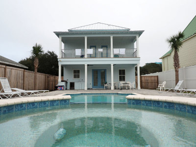 The pool and house