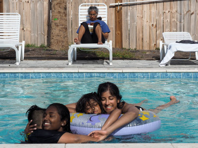 In the pool and beside the pool