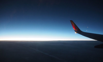 In flight early in the morning