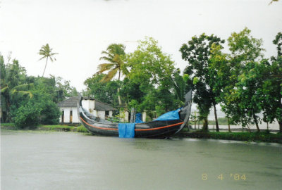 Boat on the backwaters in the rain