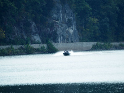 Boat against the cliff