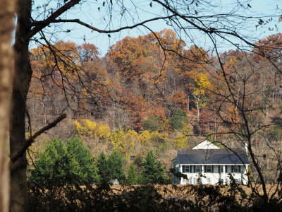 House on a farm beside the trail