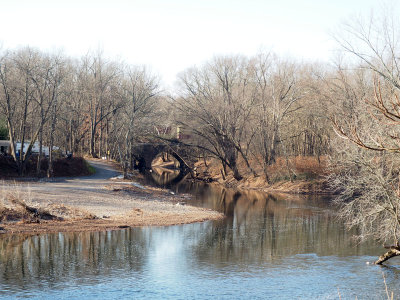 Railroad bridge and creek across the river