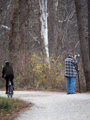 Biker and photographer on the trail