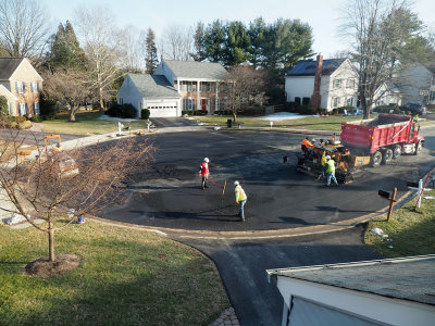 Finishing up the second layer of asphalt