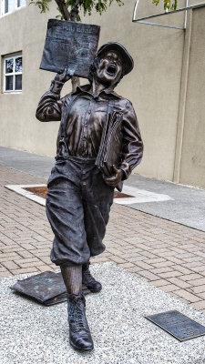Newsboy Statue
