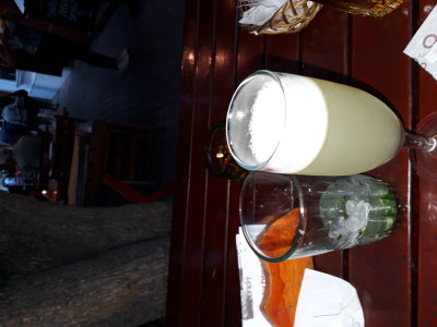 Pisco Sour and empty mojiro glass.