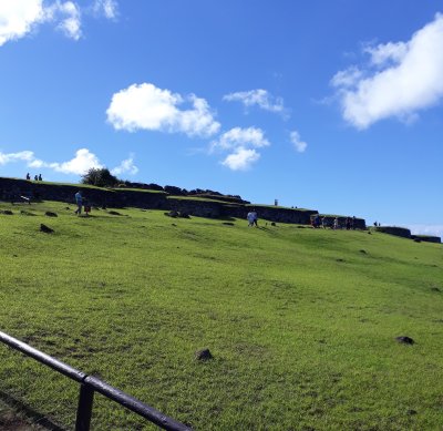 On the Rano Kau volcano. The spiritual village Orongo in the distance.