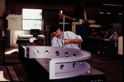 QA measuring machined part.jpg