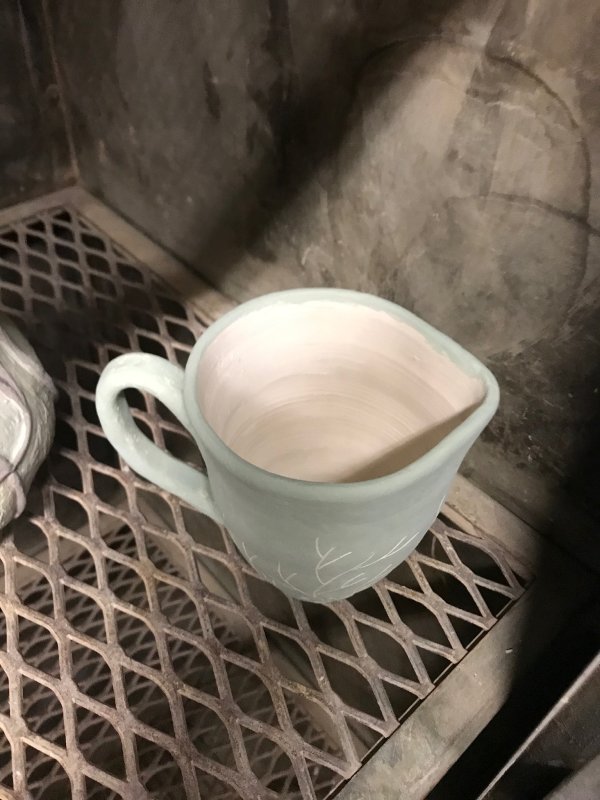 thrown pitcher