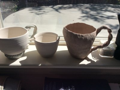 2 thrown vessels, one pinchpot