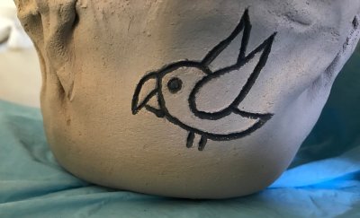 slab built pot with handles and birds