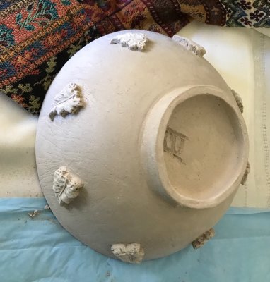 hand built bowls with embossed leaves.