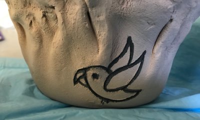 garden pot with bird