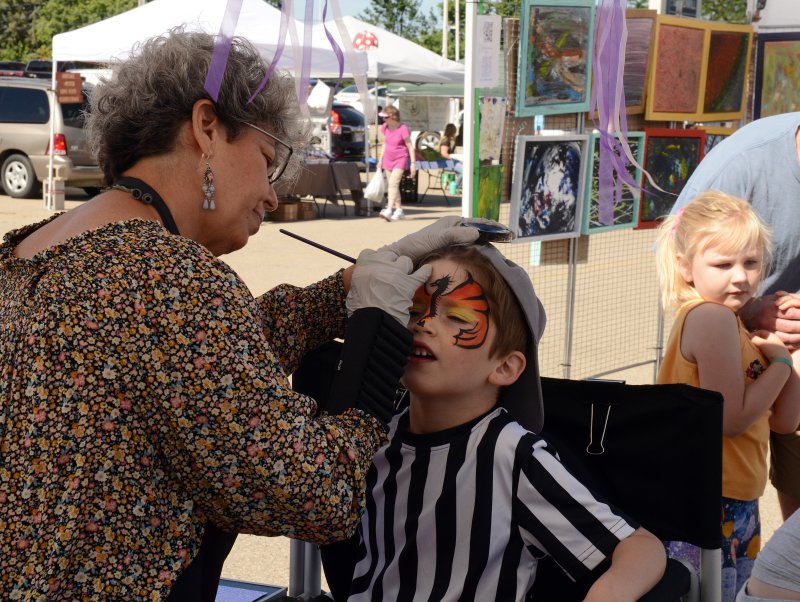 THERE WAS FACE PAINTING FOR THE KIDS