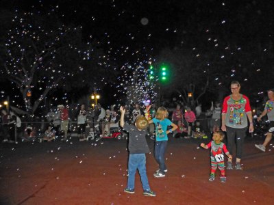 Spreading Joy with Bubbles waitng for  Mickey's Once Upon A Christmastime Parade at the Magic Kingdom