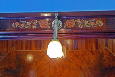 Burr wood panel and Victorian light in Ione Carriage